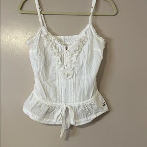 HOLLISTER tank. Size M. GUC. Many details with adjustable straps. Semi sheer.